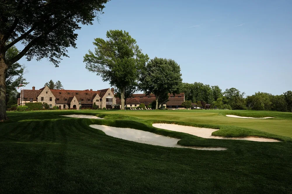 The Tudor-style clubhouse at Aronimink