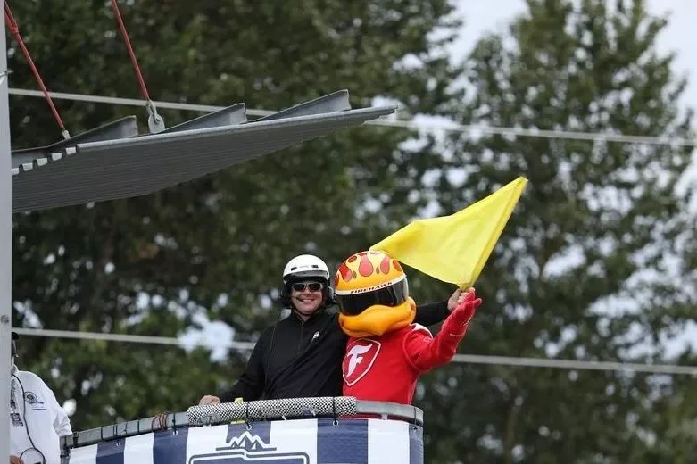 Aaron Likens waves the yellow flag with the Firestone Firehawk - Indy NXT By Firestone Grand Prix at Portland - By_ Matt Fraver_Ref Image Without Watermark_m116089